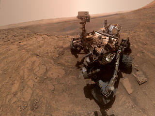 NASA's Curiosity rover took this selfie on Oct. 11, 2019, the 2,553rd Martian day, or sol, of its mission. The rover drilled twice in this location, which is nicknamed "Glen Etive."