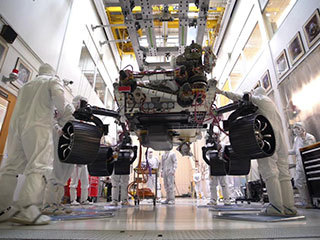 A time-lapse video, taken JPL, captures the first time NASA's Mars 2020 rover has carried its full weight on its legs and wheels.