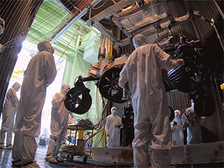 In this time-lapse video taken at JPL, engineers move the Mars 2020 rover into a large vacuum chamber for testing in Mars-like environmental conditions.