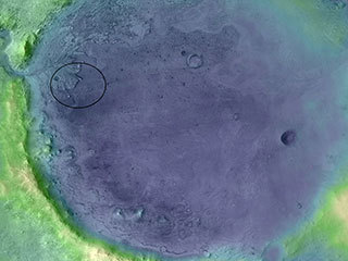 Lighter colors represent higher elevation in this image of Jezero Crater on Mars, the landing site for NASA's Mars 2020 mission. The oval indicates the landing ellipse, where the rover will be touching down on Mars.