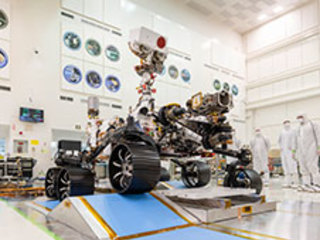 In a clean room at NASA's Jet Propulsion Laboratory in Pasadena, California, engineers observed the first driving test for NASA's Mars 2020 rover on Dec. 17, 2019.