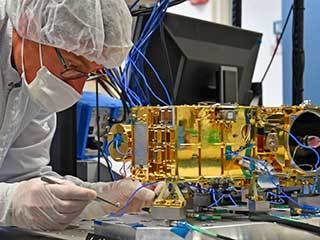 The Mast Unit for Mars 2020's SuperCam, shown being tested here, will use a laser to vaporize and study rock material on the Red Planet's surface.