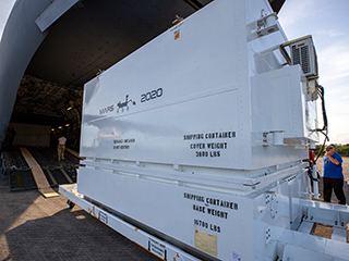 The Mars 2020 rover is offloaded from a C-17 aircraft at the Launch and Landing Facility, formerly known as the Shuttle Landing Facility, at NASA’s Kennedy Space Center on Feb. 12, 2020. 