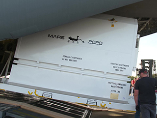 Mars 2020 rover arrives at the Shuttle Landing Facility at NASA's Kennedy Space Center for processing.