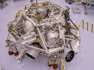 Image of the rocket-powered descent stage sitting on top of NASA's Perseverance rover 