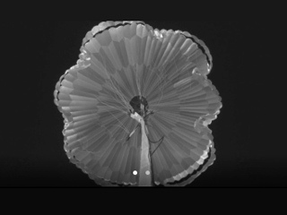 This animated GIF shows a successful test of the parachute that will be used to land NASA's Perseverance rover on Mars