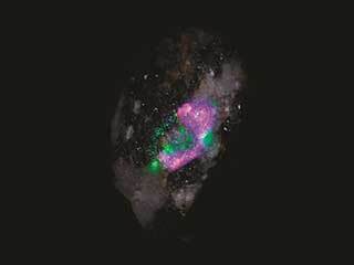 In this test image by SHERLOC, an instrument aboard NASA's Perseverance rover, each color represents a different mineral detected on a rock's surface.