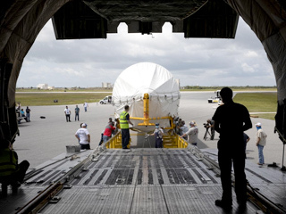 View from inside the Antonov aircraft as the rocket booster for Mars 2020 is offloaded