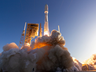 The rocket carrying the Mars 2020 mission with the Perseverance rover lifts off from KSC
