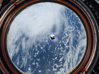 A fragment of a Martian meteorite seen floating inside the International Space Station
