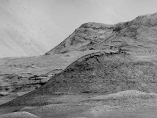 This mosaic shows various scenes captured from a location called "Housedon Hill" by the ChemCam instrument aboard NASA's Curiosity Mars rover between September 9 and October 23, 2020 (Sols 2878 and 2921).