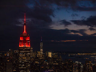 Empire State Building in New York began lighting its tower red on Tuesday, Feb. 16, starting at sunset.