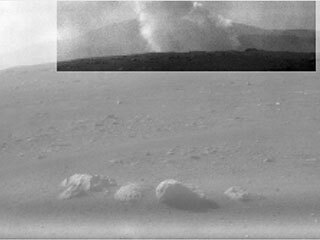 This image from one of the rear Hazard Cameras, or Hazcams, aboard NASA's Perseverance Mars rover, shows a smoke plume from the crashed descent stage that lowered the rover to the Martian surface. 
