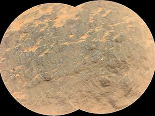 Combining two images, this mosaic shows a close-up view of the rock target named “Yeehgo” from the SuperCam instrument on NASA’s Perseverance rover on Mars.
