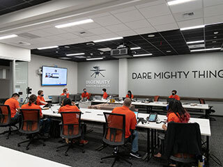Members of NASA’s Ingenuity helicopter team in the Space Flight Operations Facility at NASA’s Jet Propulsion Laboratory prepare to receive the data downlink showing whether the helicopter completed its first flight on April 19, 2021.