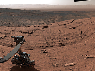 NASA's Curiosity Mars rover took this 360-degree panorama while atop "Mont Mercou," a rock formation that offered a view into Gale Crater below. 