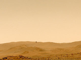 NASA’s Ingenuity Mars Helicopter’s fifth flight was captured on May 7, 2021, by one of the navigation cameras aboard the agency’s Perseverance rover. This was the first time it flew to a new landing site.