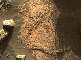 NASA’s Perseverance Mars rover used the WATSON camera on the end of its robotic arm to conduct a focus test on May 10, 2021, the 79th Martian day, or sol, of the mission.
