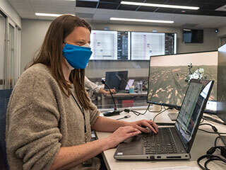Andrea Connell, software engineer at NASA’s Jet Propulsion Laboratory in Southern California, works with the Component-based Campaign Planning, Implementation, and Tactical software tool, or COCPIT, in the Mars 2020 Perseverance Tactical Planning Room.