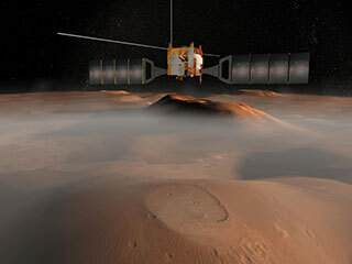 ESA’s (the European Space Agency’s) Mars Express flies over the Red Planet in this illustration.