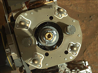 This enhanced-color image from the Mastcam-Z instrument aboard NASA’s Perseverance rover shows sample tube inside the coring bit after the Aug. 6 coring activity was completed. 