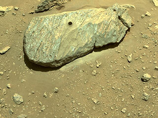 The drill hole from Perseverance's second sample-collection attempt can be seen, in this composite of two images taken on Sept. 1, by one of the rover’s navigation cameras. 