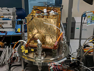 This engineering model of Mars Oxygen In-Situ Resource Utilization Experiment (MOXIE) instrument is about to undergo vibration testing in a lab at the Jet Propulsion Laboratory in Pasadena, California. Vibration tests demonstrate the ability of instruments to survive the extreme conditions of both a rocket launch from Earth and a landing on Mars. 
