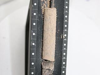 Image of a rock core testing with the Sample Caching system.