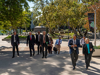 On Oct. 14, 2021, NASA Administrator (second from left) and Deputy Administrator Pam Melroy (far right) visited the agency's Jet Propulsion Laboratory to discuss NASA's climate efforts and the latest developments with the agency's Perseverance rover and Mars. With them are (from far left) Thomas Rosenbaum, president of Caltech, which manages the Jet Propulsion Laboratory for NASA; JPL Interim Director Larry James; JPL CFO Sammy Kayali; and NASA Office of JPL Management and Oversight Marcus Watkins.