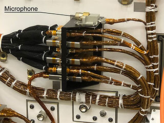 NASA’s Perseverance Mars rover carries two commercial-grade microphones, including this one on its chassis.