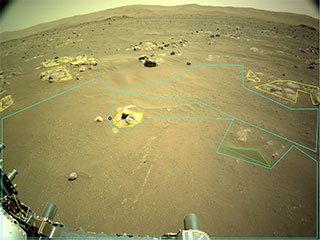 This is an image of the rocky, sandy surface of Mars with outlines of the artificial intelligence software on the image. The artificial intelligence software is outlinig particular rocks int the front view. Low hills are present in the horizon of the image.