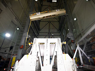 A mock rocket is thrown into the air at NASA’s Jet Propulsion Laboratory during tests of a launch system that would fire a rocket off of Mars.