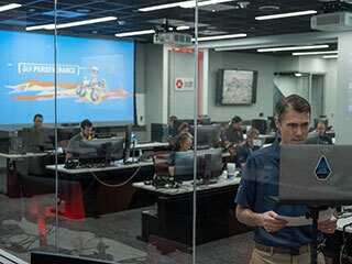 On April 5, 2022, inside the Mars Perseverance rover control room at NASA's Jet Propulsion Laboratory in Southern California, the rover team's deputy mission manager, Robert Hogg, and other team members interacted virtually with students who have overcome academic obstacles.