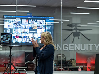 Perseverance rover Project Manager, Jennifer Trosper, led team members in applause in a control room at NASA's Jet Propulsion Laboratory in Southern California on April 5, 2022.