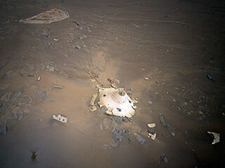 This image of Perseverance’s backshell and parachute was collected by NASA’s Ingenuity Mars Helicopter during its 26th flight on April 19, 2022. Images obtained during the flight may provide insight into the components’ performance during the rover’s entry, descent, and landing on Feb. 18, 2021. 