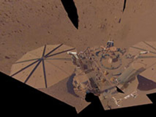 NASA’s InSight lander took this final selfie on April 24, 2022, the 1,211th Martian day, or sol, of the mission. The lander is covered with far more dust than it was in its first selfie, taken in December 2018, not long after landing – or in its second selfie, taken in March and April of 2019.