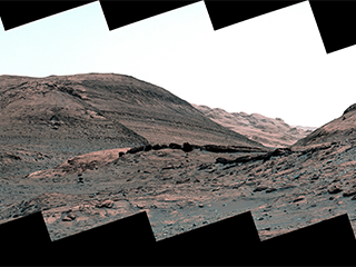 NASA’s Curiosity Mars rover captured this view of a sulfate-bearing region using its Mastcam on May 2, 2022, the 3,462nd Martian day, or sol, of the mission – dark boulders seen near the center are thought to have formed from sand deposited in ancient streams or ponds.