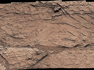 NASA’s Curiosity Mars rover captured evidence of layers that built up as windblown sand both accumulated and was scoured away at a location nicknamed “Las Claritas" – this image was captured using Curiosity’s Mast Camera, or Mastcam, on May 19, 2022, the 3,478th Martian day, or sol, of the mission.