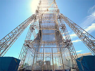This drop tower at JPL includes a bow launch system, which can hurl test articles 110 mph into the ground, re-creating the forces they would experience during a Mars landing.
