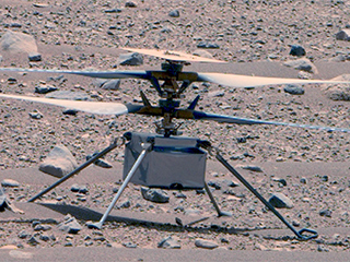 This enhanced color image of NASA's Ingenuity Mars Helicopter was taken by the Mastcam-Z instrument aboard Perseverance on April 16, 2023, the 766th Martian day, or sol, of the rover's mission.