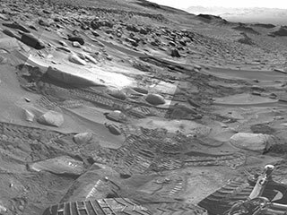 NASA’s Curiosity Mars rover left several sets of tracks where the rover experienced a fault, or unexpected stoppage mid-drive, while climbing a particularly difficult slope. 