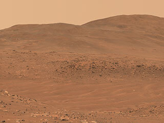 This natural-color mosaic showing NASA’s Ingenuity Mars Helicopter at “Valinor Hills” was acquired by the agency’s Perseverance Mars rover on Feb. 21, 2024, the 1,068th Martian day, or sol, of the mission. 