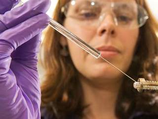 Picture of Goddard scientist Jennifer Eigenbrode performing a test.