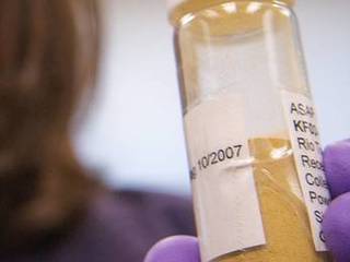 Image of Jennifer Eigenbrode using a soil simulant