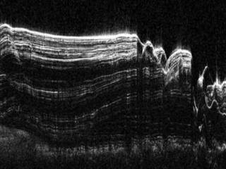 This image shows a cross-section of a portion of the north polar ice cap of Mars, derived from data acquired by the Mars Reconnaissance Orbiter's Shallow Radar (SHARAD), one of six instruments on the spacecraft.