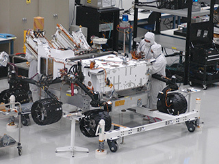 Mars rover Curiosity with newly installed wheels.