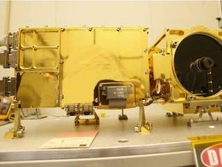 The two main parts of the ChemCam laser instrument for NASA's Mars Science Laboratory mission are shown in this combined image.