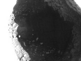 This enhanced image shows the inside of a rimless pit about 310 meters (1,017 feet) in diameter, northwest of the mountain Ascraeus Mons in the northern hemisphere of Mars.