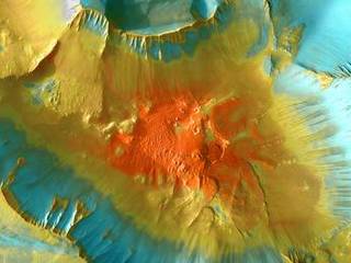 A false-color mosaic focuses on one junction in Noctis Labyrinthus where canyons meet to form a depression 4,000 meters (13,000 feet) deep.