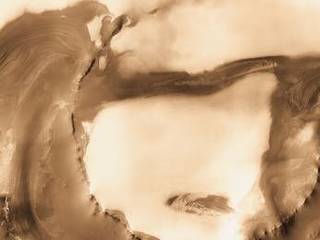 Although it is 45 kilometers (28 miles) wide, countless layers of ice and dust have all but buried Udzha Crater.